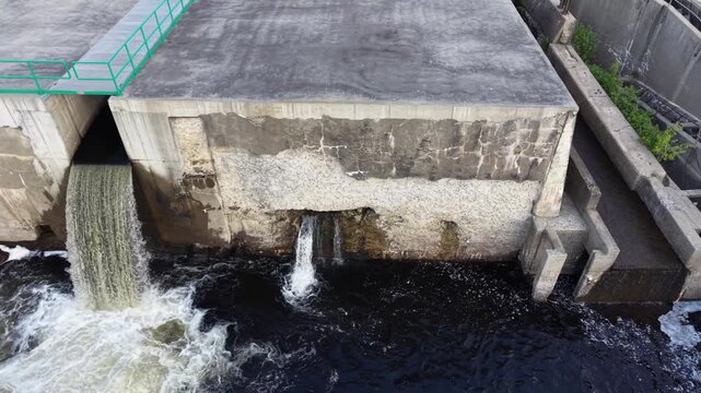 Straight up drone reveal of the spillway dam in Howland Maine 