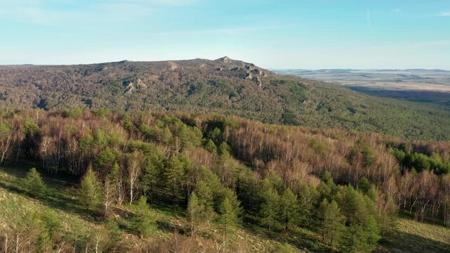 Urals in spring: Irendyk ridge, Ulu-Sykty mountain. Aerial view.