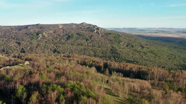 Urals in spring: Irendyk ridge, Ulu-Sykty mountain. Aerial view.
