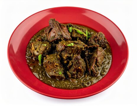 Koppal Mutton Banni Green Roast On Crimson Brick Red Plate Isolated On White Background