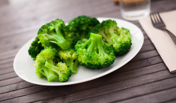 diet food. steamed broccoli on plate