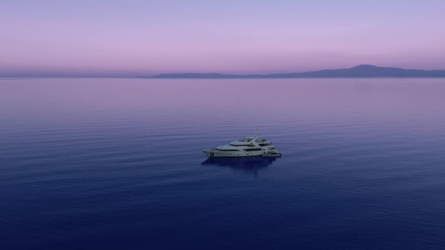 Anchored yachts near Verga cliffs before sunrise, calm Mediterranean sea and dramatic coastal mountains near Kalamata, Greece