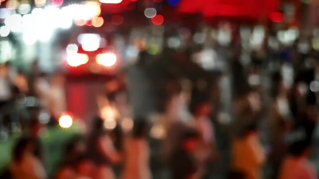 A vibrant and bustling night scene in Beijing, showcasing a dynamic crowd moving through a crowded street under warm and colorful lights