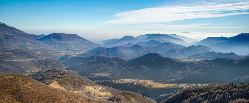 Wide panoramic high angle view of Val Leogra and Little Dolomites mountains from Colle Bellavista near Ossuary Pasubio monument in Valli del Pasubio, Vicenza, Veneto, Italy.Strada delle 52 Gallerie