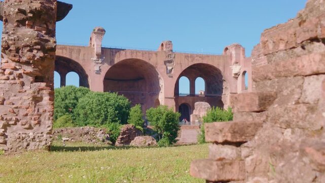 Ancient Brick Ruins with Basilica of Maxentius at the Roman Forum