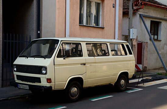 Belgrade, Serbia,  a retro Volkswagen minibus parked on a city street.