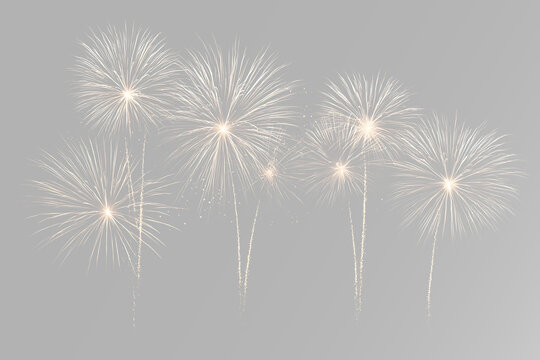 Bright golden fireworks display with sparkling pyrotechnic bursts, glowing trails and festive celebration lights, overlay