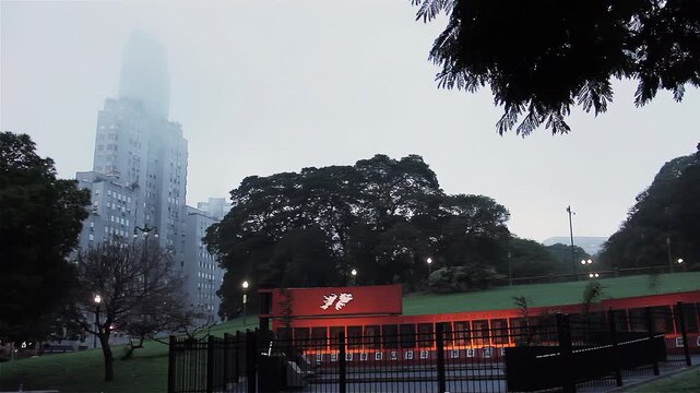 Malvinas War Memorial In Plaza San Martin With Kavanagh Building In Fog, Buenos Aires - 4K