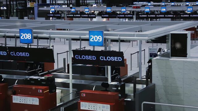 Closed Airport Check In Counters At Night With Dust Particles Floating - 4K