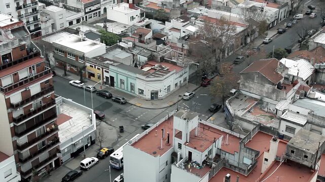 High Angle View Of Public City Bus Navigating Street Intersection in Buenos Aires, Argentina - 4K