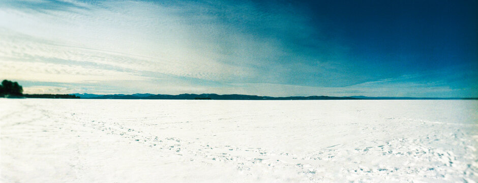 Panoramic lake Champlain frozen over and covered in snow, Burlington, Vermont, United States