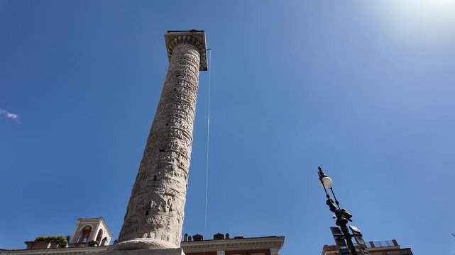 Aesthetic cinematic view of the historic Column of Marcus Aurelius in Rome