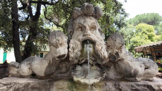 Majestic Baroque Triton Fountain in scenic Villa Borghese Gardens Rome