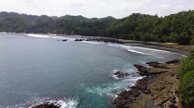 Aerial Drone View of Wediombo Beach Natural Lagoon, Yogyakarta, Indonesia