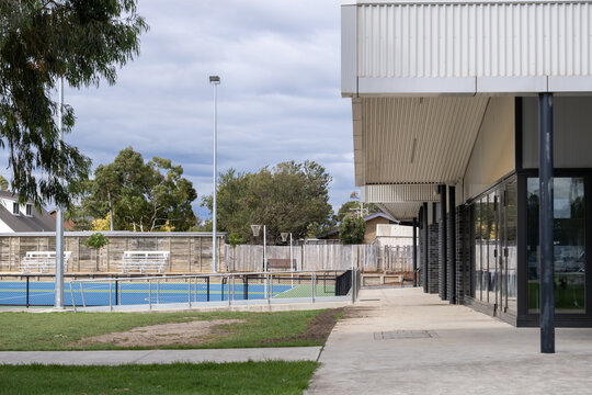 Modern community sports centre building beside outdoor courts in Hoppers Crossing Melbourne Australia. Suburban council recreation facility. Concept of wellbeing infrastructure