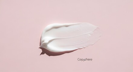 Fototapeta premium Closeup of white cream on pink.