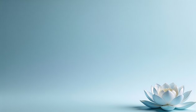 A delicate lotus flower rests serenely on a light blue background, symbolizing tranquility and purity