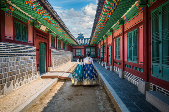 A young woman wearing a hanbok South Korea's traditional attire at Gyeongbokgung Palace in Seoul, South Korea.