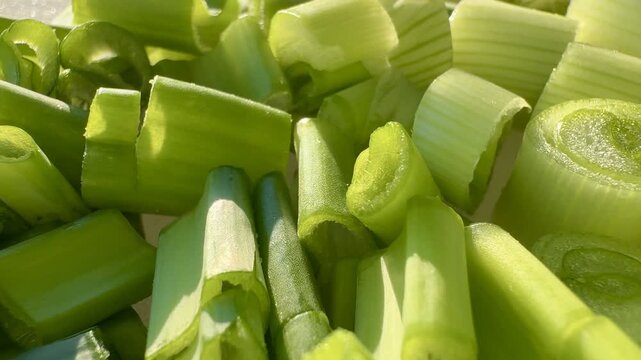 Chopped Spring Onion in Changing Summer Light