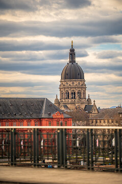 Christuskirche dome above historic riverside buildings in Mainz Germany