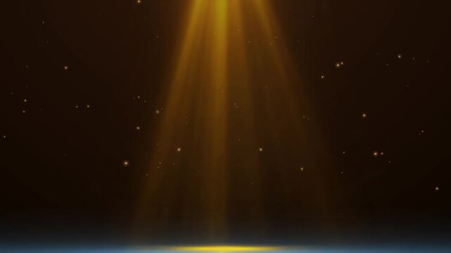 Golden spotlight beams with floating dust particles on dark background for cinematic stage performance visual effects and motion graphics background animation