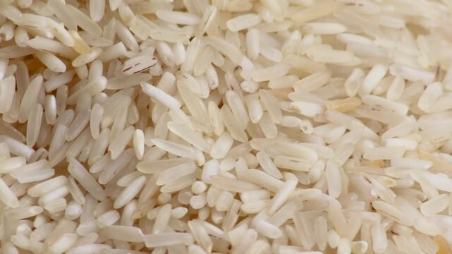 White rice grains shifting across surface