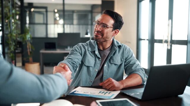 Business, merger or man in office with handshake, greeting or negotiation in company deal. Networking, introduction or employees with shaking hands, agreement or opportunity in b2b partnership.