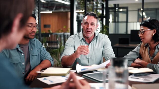 Office, meeting and businessman with paperwork, charts and investment management with data analysis. Business people, talk and financial forecasting with documents, graphs and collaboration with info