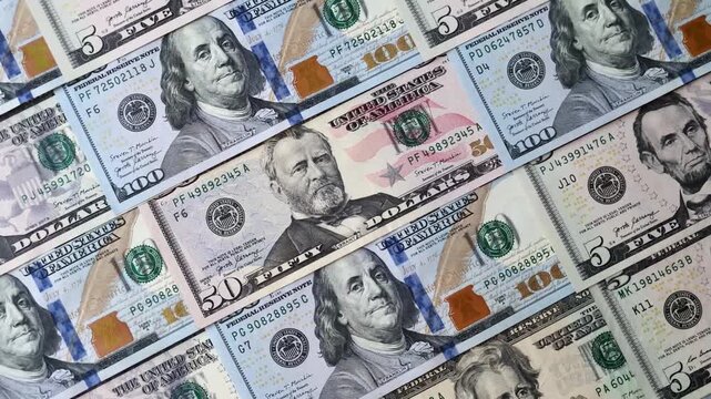 Paper US dollar bills of various denominations and cent coins as a business tool for exchange and trade. Cash US dollars as a background for your design