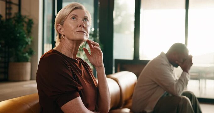 Frustrated, couple and fight with ignore in home for divorce, conflict or living room dispute. Upset, interracial people or relationship with disagreement or argument for break up or separation
