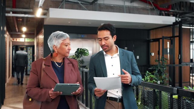 Team, walk and business people with paperwork, discussion and insurance advice with mentor in office. Collaboration, tablet or employees with update, financial coverage or help with policy document