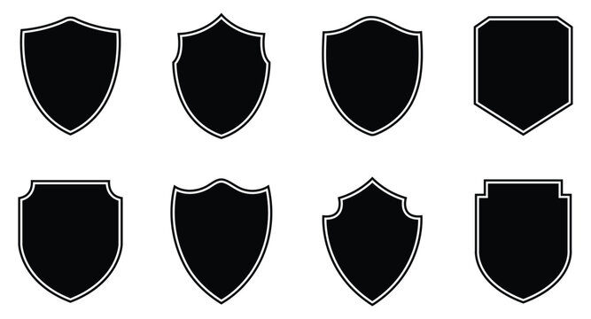 Collection of black shield icons with outlines for security, defense, or heraldic design elements on white background