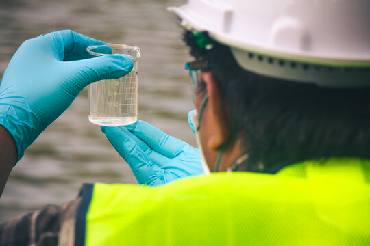 Field inspection of water resources with sample collection for environmental research and safety.