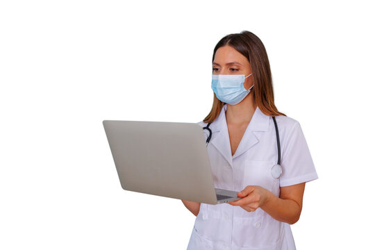 Female doctor wearing surgical mask and stethoscope, using laptop for telemedicine and online medical consultations, transparent background
