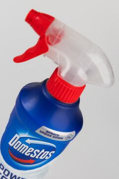 Domestos Power Foam Arctic Fresh spray bottle with red trigger isolated on light background