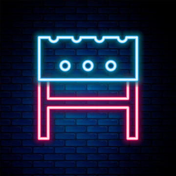 Glowing neon line BBQ brazier icon isolated on brick wall background. Colorful outline concept. Vector