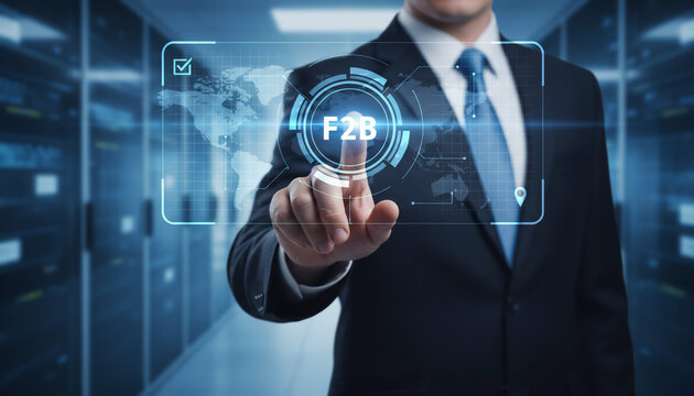 Business executive using global digital network interface featuring f2b acronym.