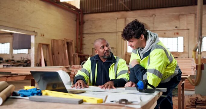 Architecture, review or team in workshop with blueprint, building plan or feedback on furniture project. Discussion, men or contractor with layout, operations report or design process in woodworking.