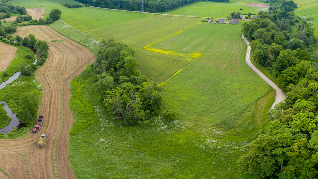Aerial View of Meandering River and Farmland in Lithuania