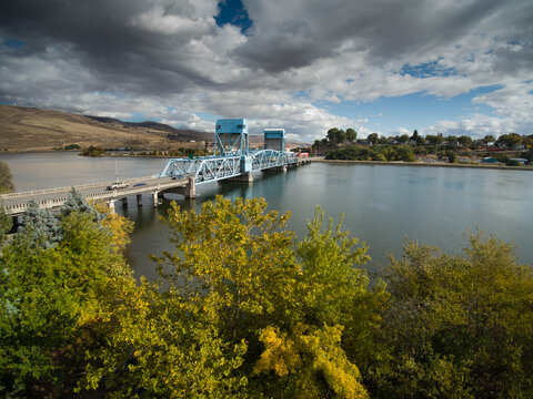 drone aerial photo of blue draw bridge connecting Lewiston ID and Clarkston WA over the Snake River