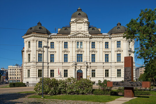 Riga Regional Court building and Gunars Astra monument in Riga, Latvia