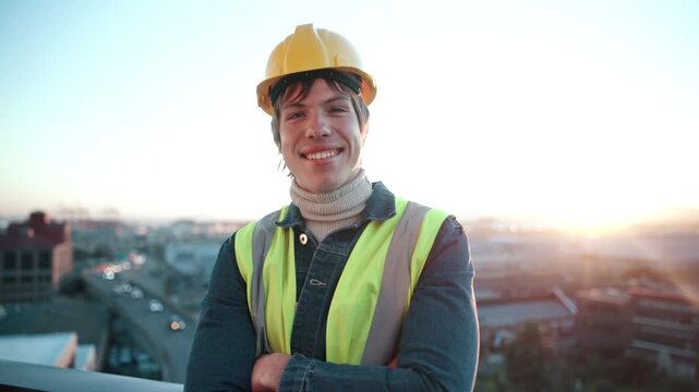 Face, man and engineer outdoor with arms crossed, inspection or architecture for infrastructure. Portrait, male person or contractor on rooftop, positive attitude and quality control for construction