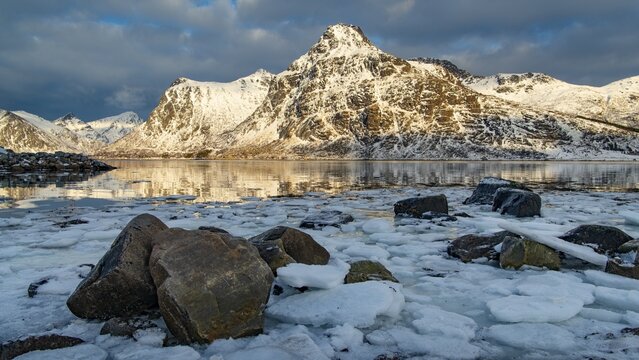 Winter Scandinavian landscape, ice floes, mountains, snow, Vareid, Nordland, Lofoten, Norway