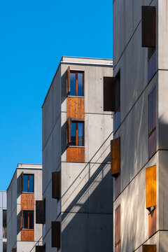 Dense urban building volumes in La Confluence, Lyon, France show apartments architecture and residential development across a compact district edge