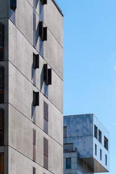 New residential development in La Confluence, Lyon, France frames apartments architecture, with an urban building corner rising across the district skyline