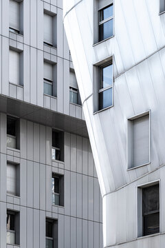 New apartments architecture documents residential development in La Confluence, Lyon, France, where an urban building facade folds around a quiet district atrium