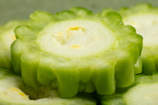 Bitter gourd on a green background