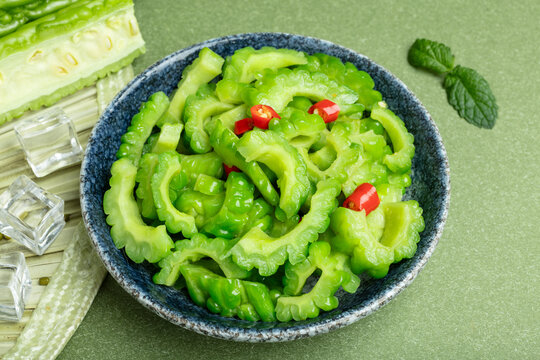 A plate of green stir fried bitter gourd