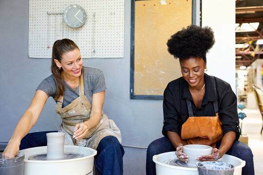 Pottery Artists Working Together in a Studio