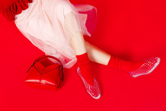 Woman red socks and red bag